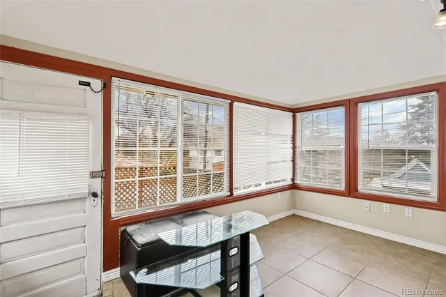 a view of a room with a large window