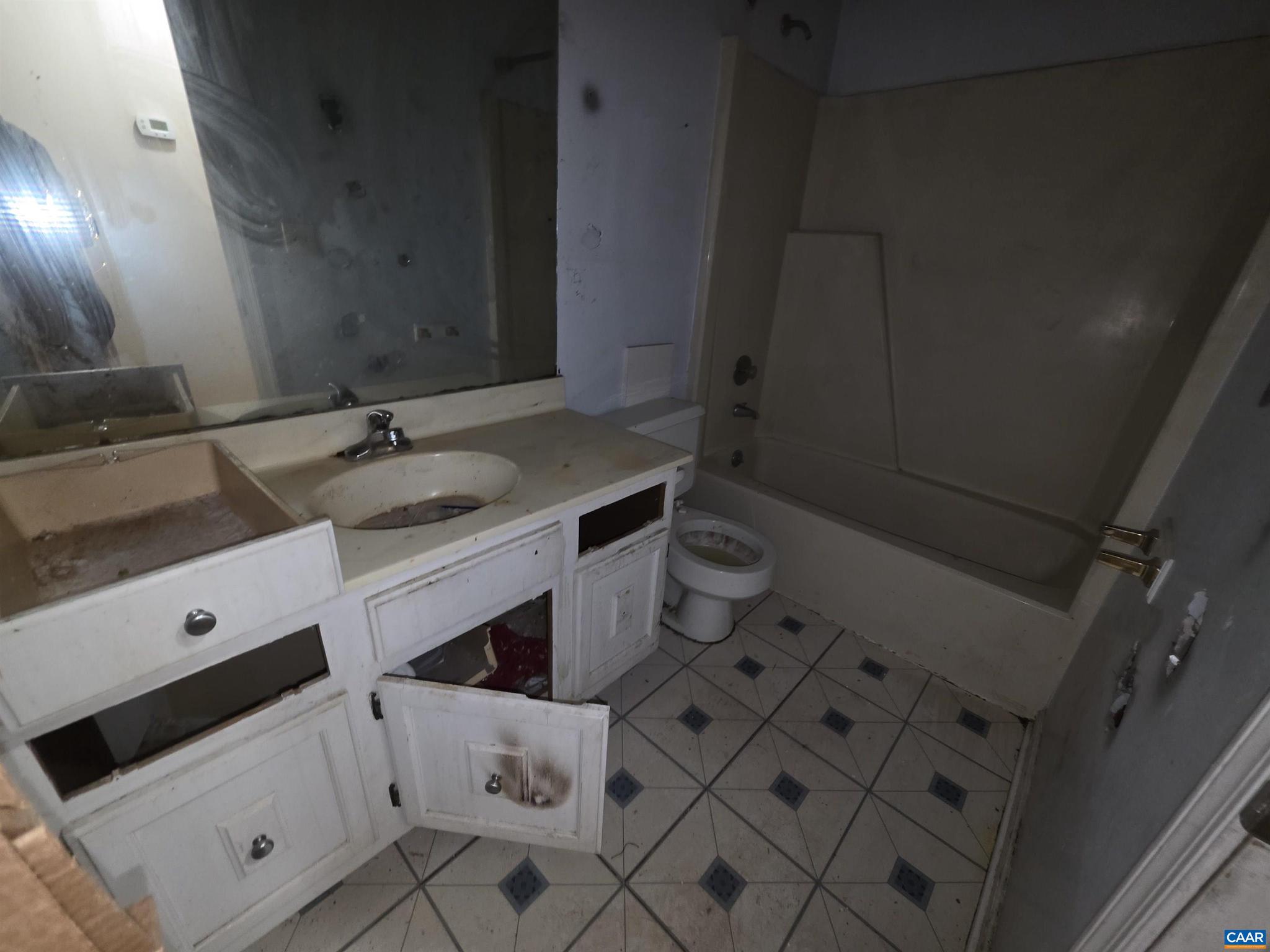 1506 Trailridge Road Charlottesville, VA 22903 - Photo 8 of 15 a bathroom with a sink toilet and mirror