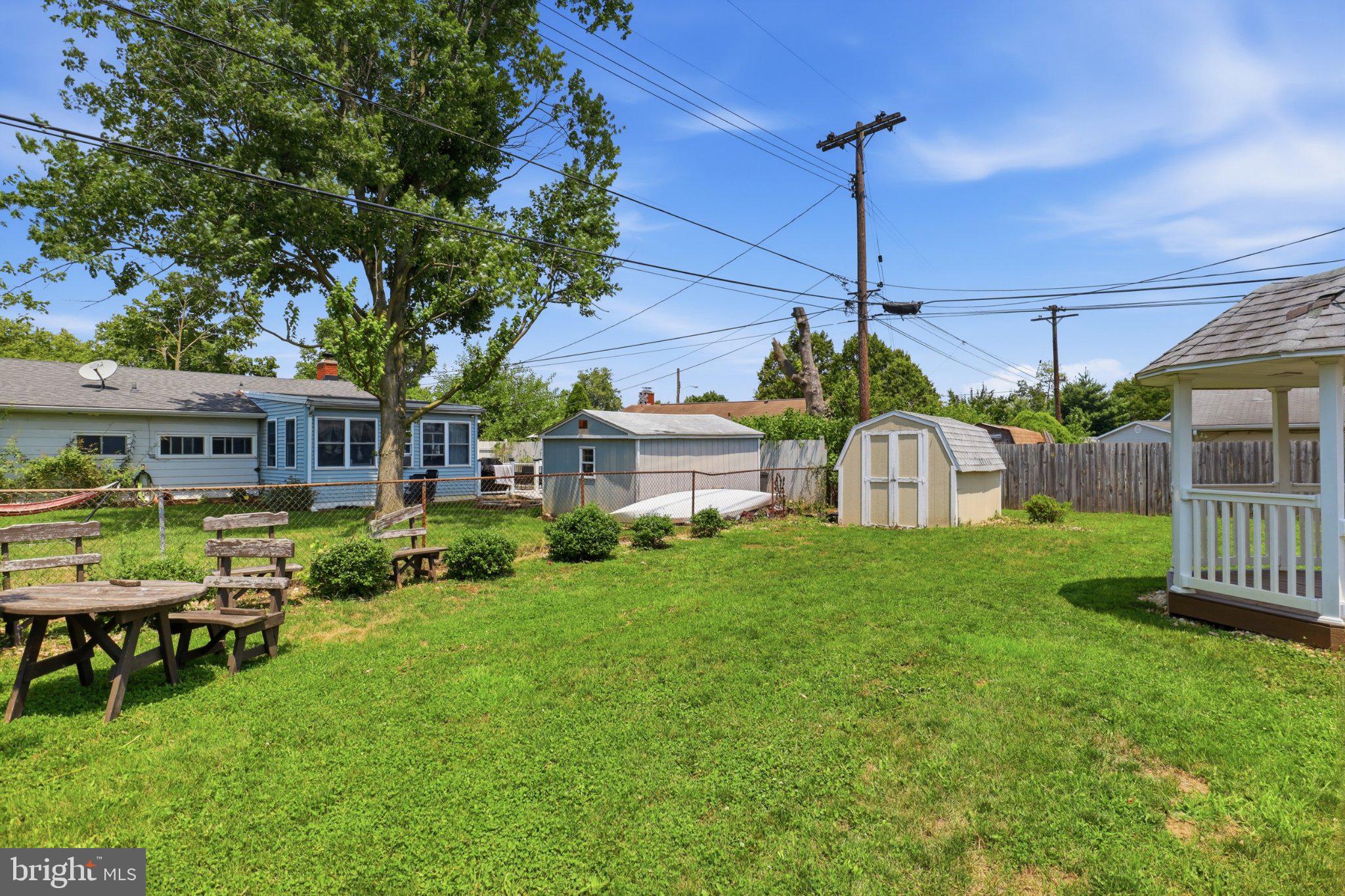 807 Fireside Road York, PA 17404 - Photo 17 of 31 Spacious backyard with charming sheds.