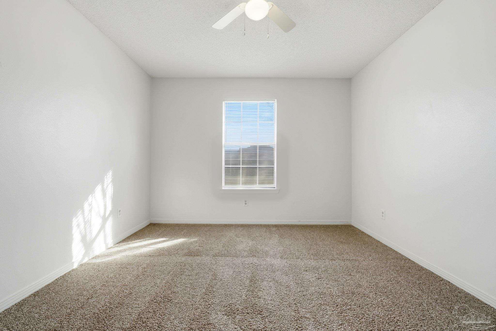 3228 Copper Ridge Circle Cantonment, FL 32533 - Photo 17 of 38 an empty room with a window