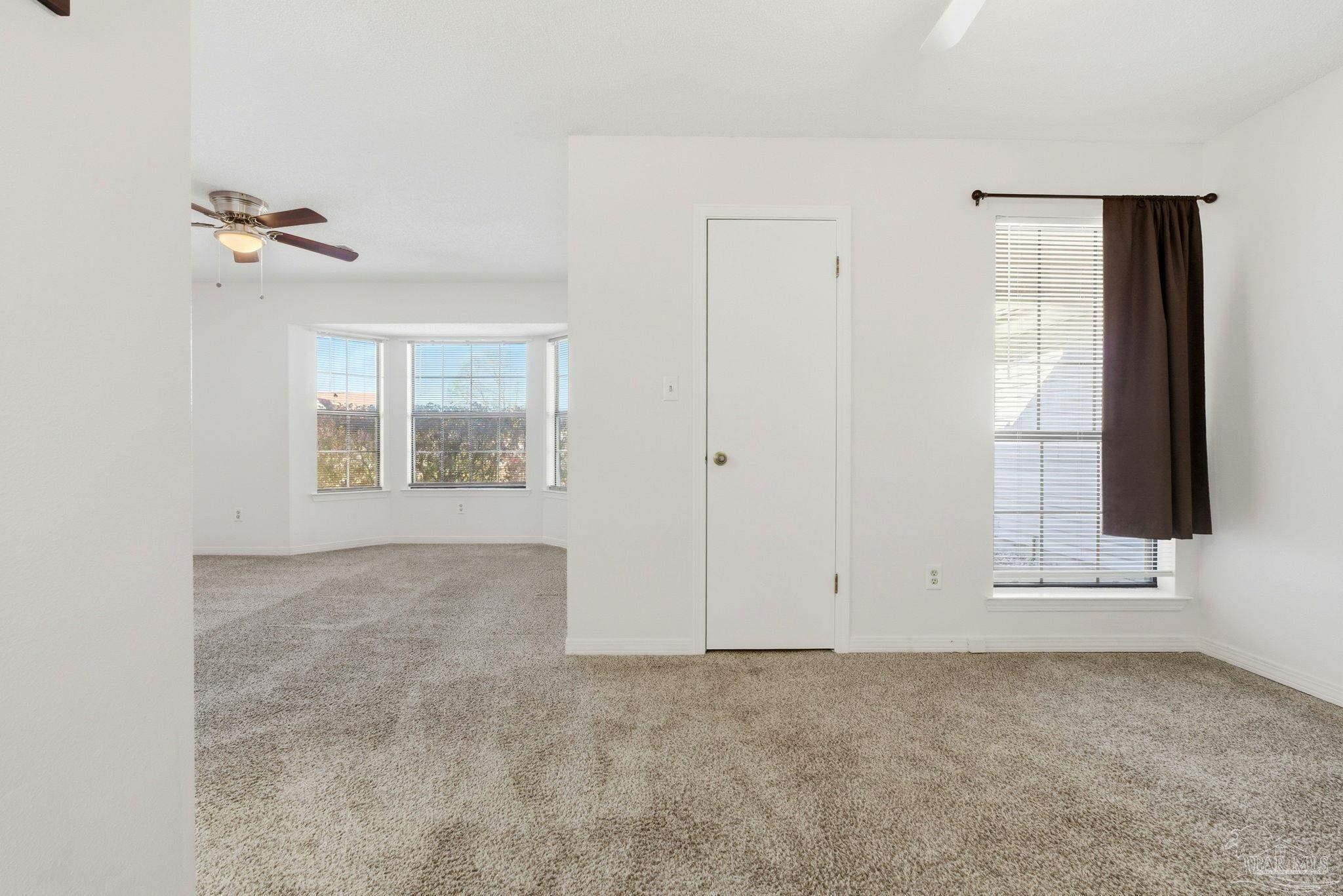 3228 Copper Ridge Circle Cantonment, FL 32533 - Photo 23 of 38 an empty room with windows