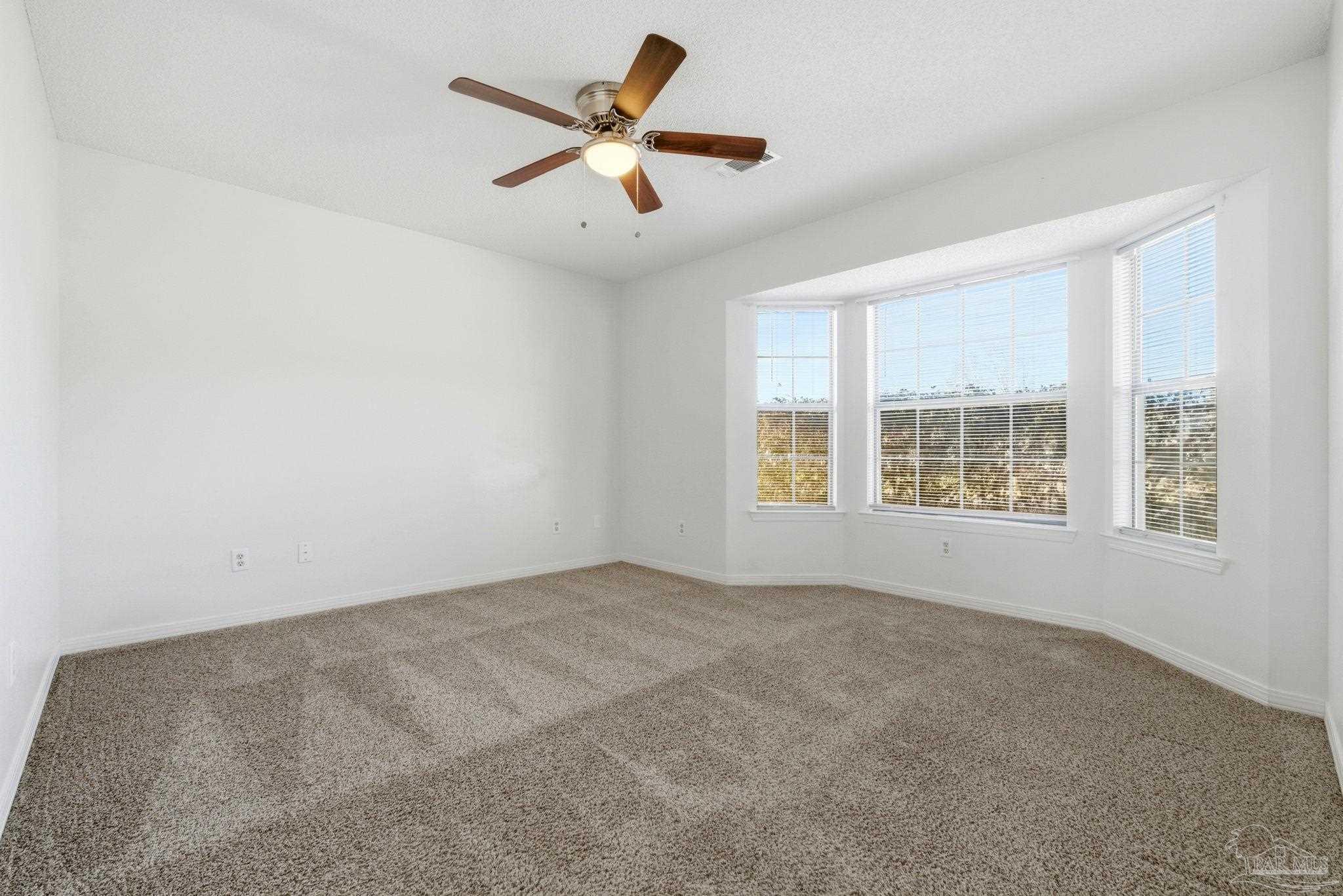 3228 Copper Ridge Circle Cantonment, FL 32533 - Photo 28 of 41 an empty room with a window