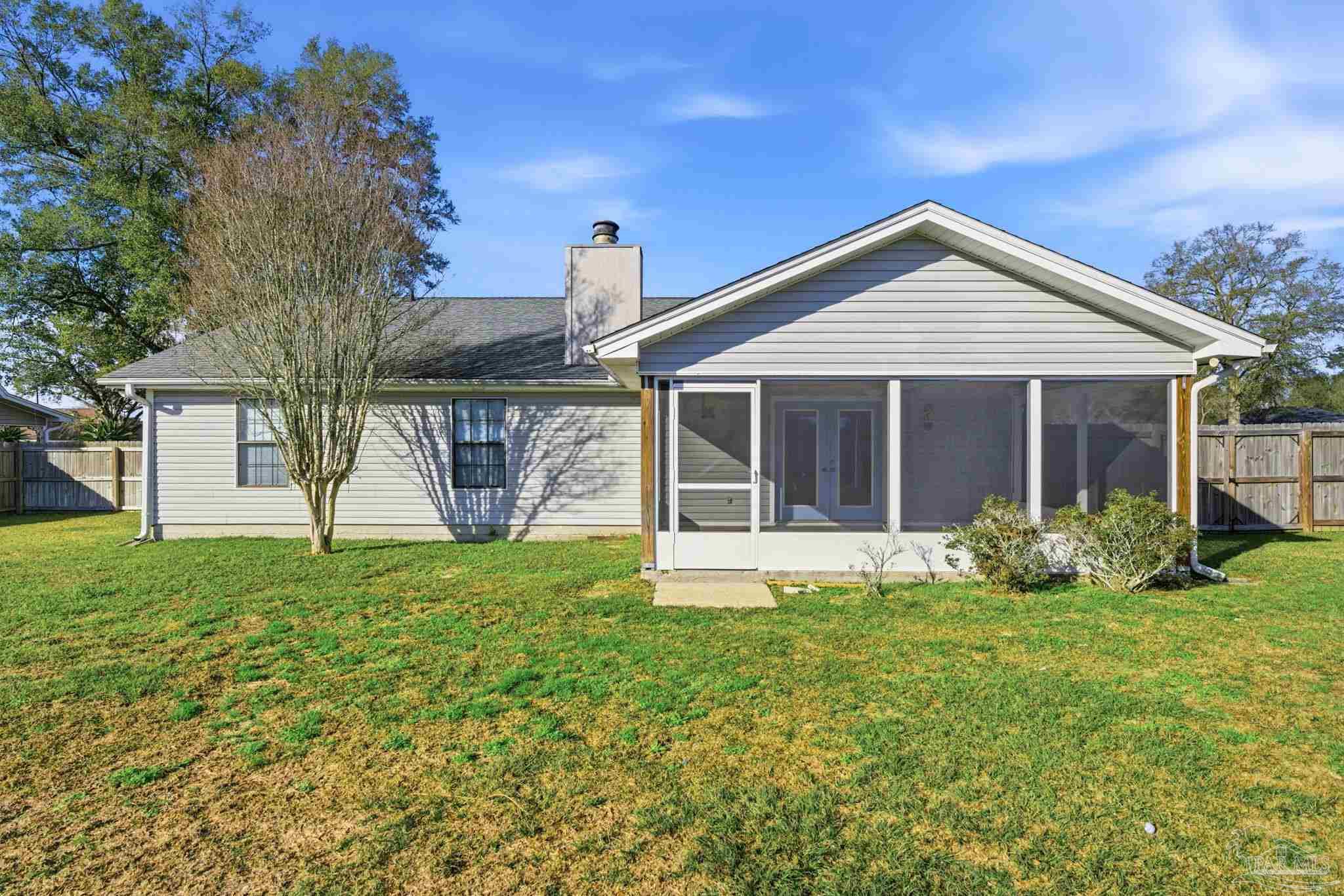 3228 Copper Ridge Circle Cantonment, FL 32533 - Photo 38 of 41 a front view of a house with garden