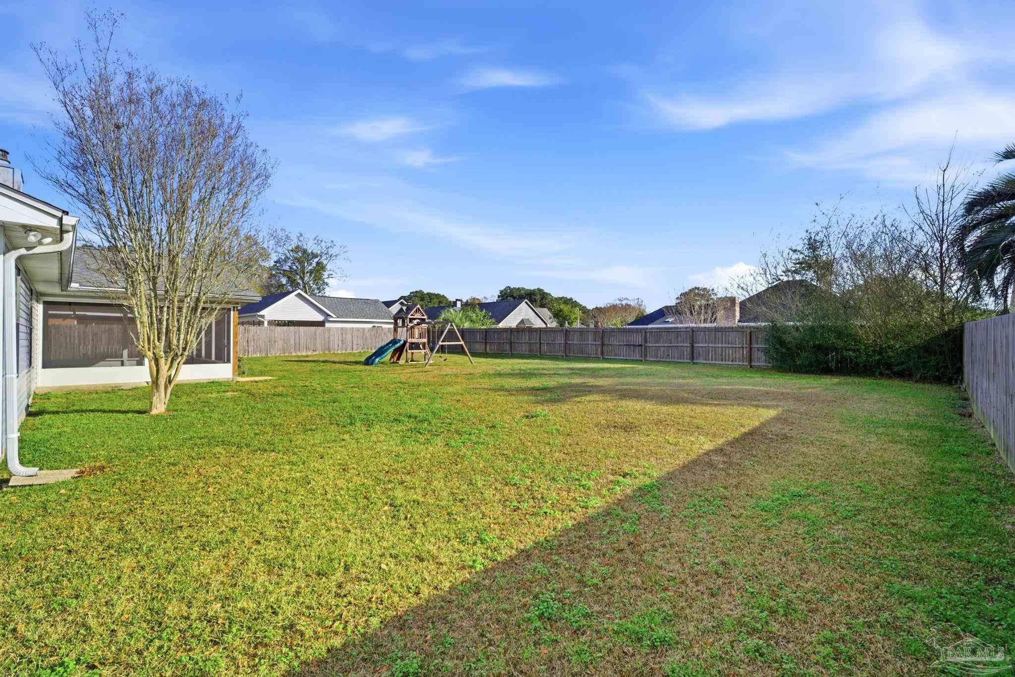 3228 Copper Ridge Circle Cantonment, FL 32533 - Photo 41 of 41 a view of a house with a big yard