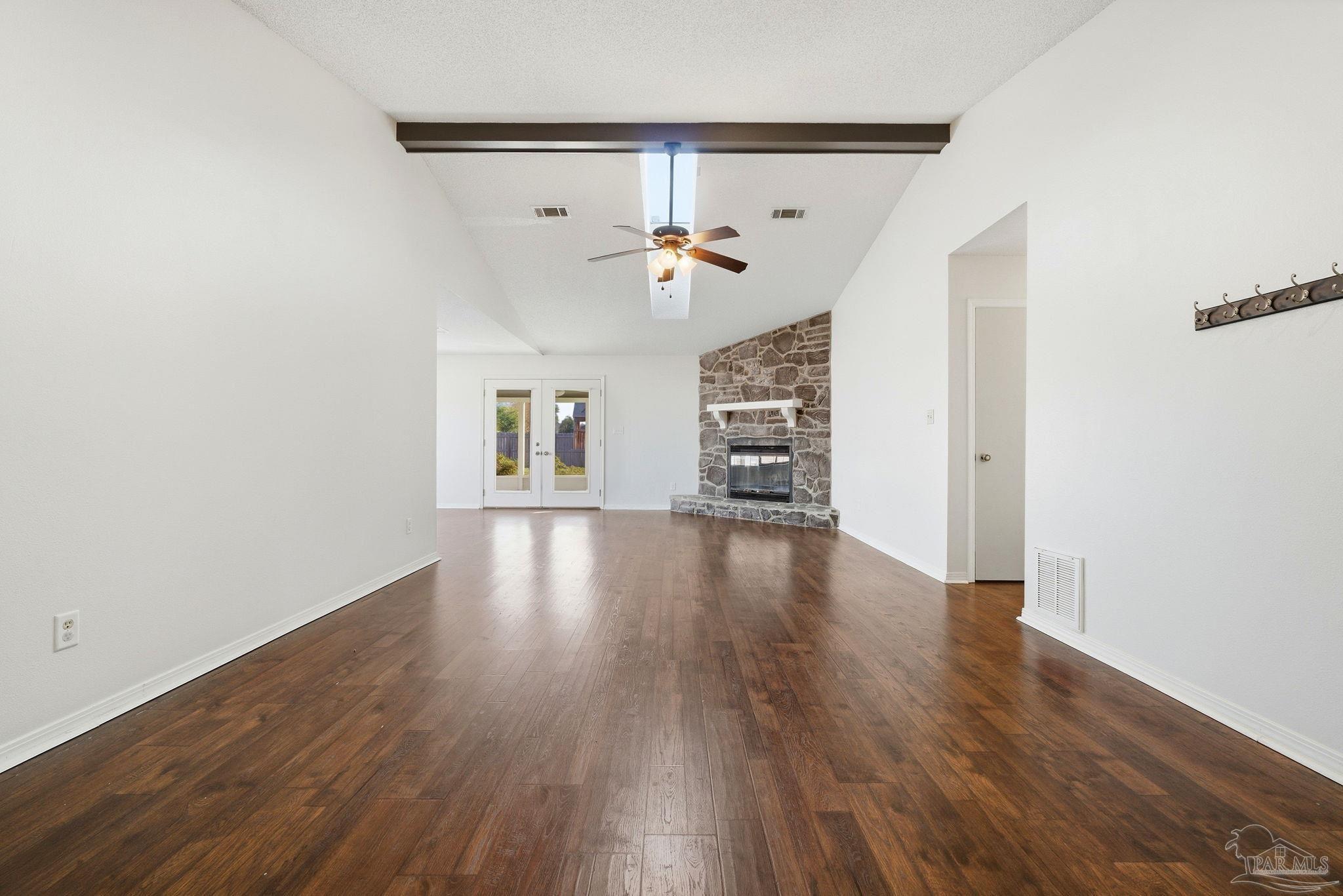 3228 Copper Ridge Circle Cantonment, FL 32533 - Photo 7 of 41 wooden floor in an empty room with a window