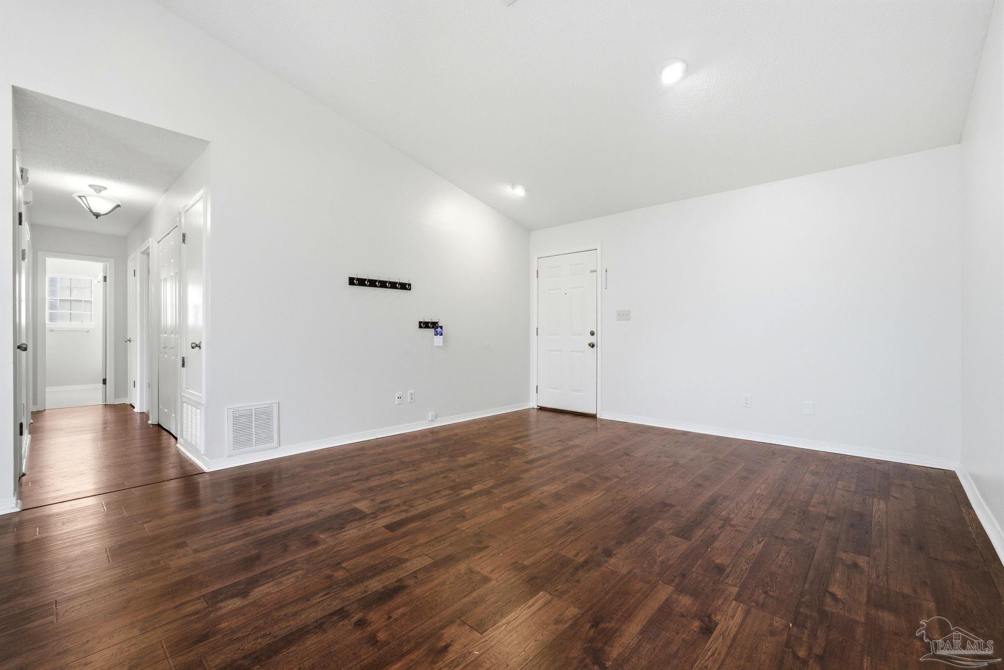 3228 Copper Ridge Circle Cantonment, FL 32533 - Photo 8 of 41 a view of a livingroom with wooden floor