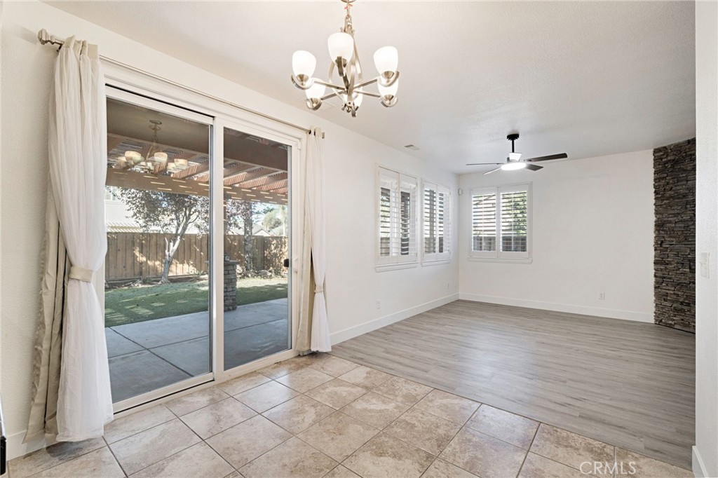 692 Blueberry Lane Madera, CA 93638 - Photo 11 of 44 a view of an empty room with a window