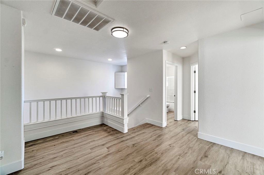 692 Blueberry Lane Madera, CA 93638 - Photo 20 of 44 a view of entryway with wooden floor