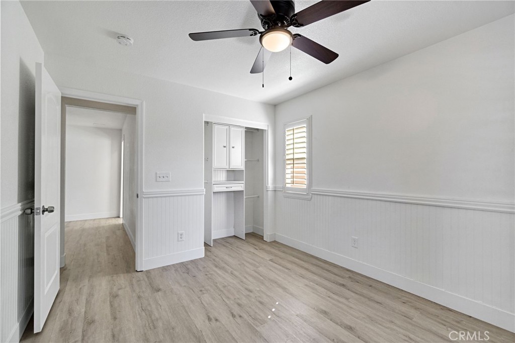 692 Blueberry Lane Madera, CA 93638 - Photo 28 of 44 wooden floor in an empty room with a window