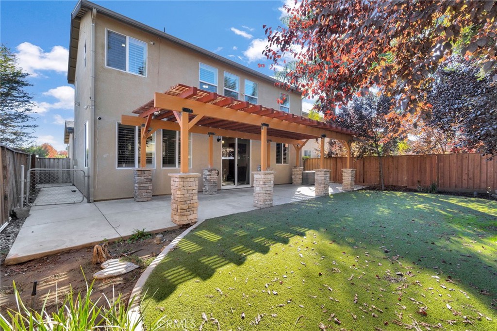 692 Blueberry Lane Madera, CA 93638 - Photo 36 of 44 a view of a house with backyard and sitting area