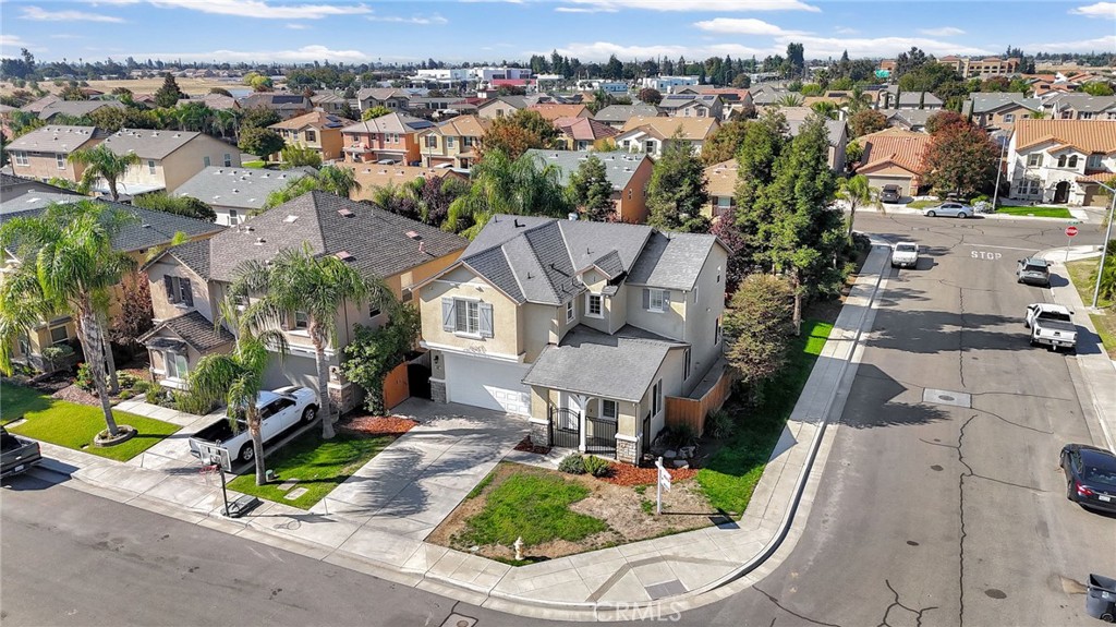 692 Blueberry Lane Madera, CA 93638 - Photo 38 of 44 an aerial view of a house with a garden