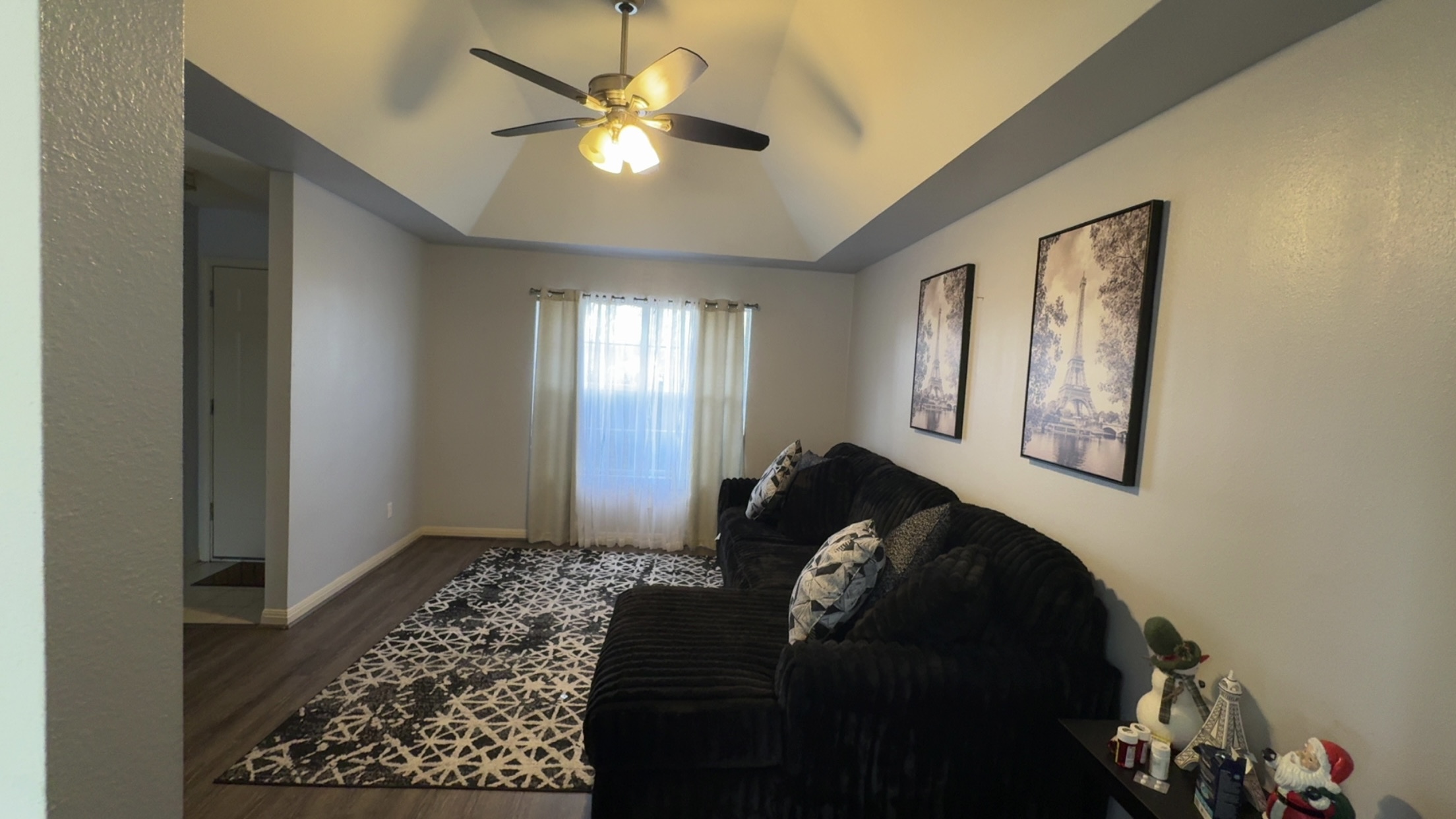 310 Raintree Drive Georgetown, TX 78626 - Photo 3 of 8 a bed room with a bed and a chandelier