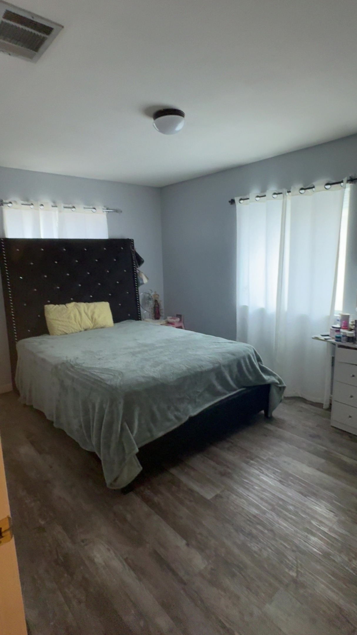 310 Raintree Drive Georgetown, TX 78626 - Photo 6 of 8 a bedroom with a bed and window