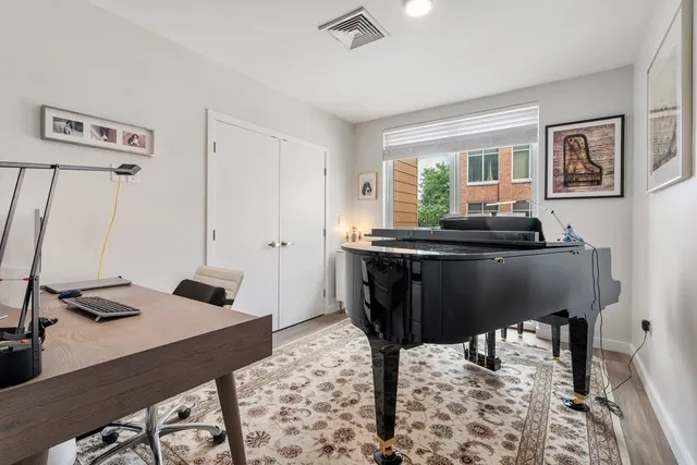 a view of a workspace with furniture