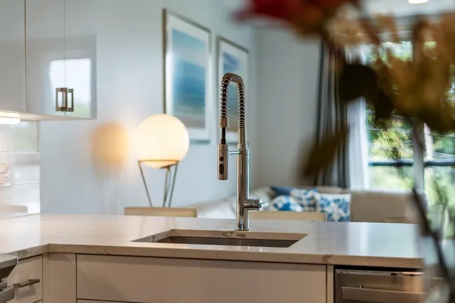 a view of a bathroom sink and a mirror