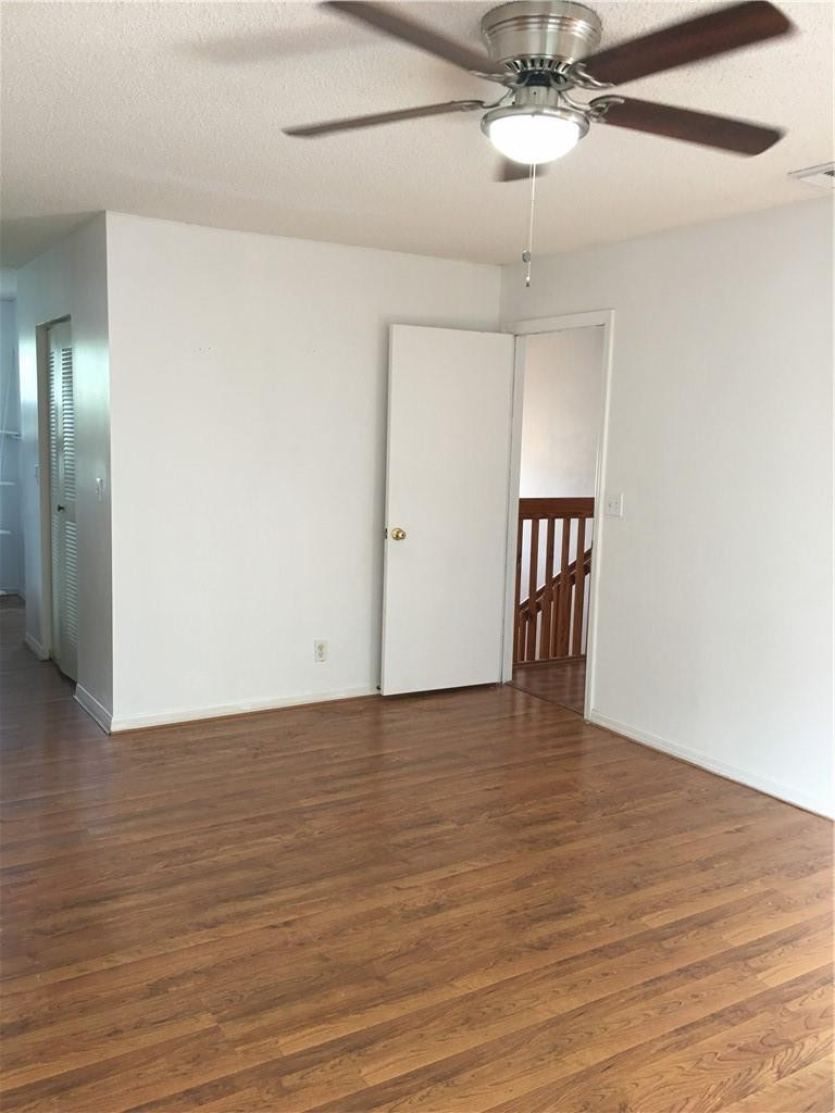 8422 Southwest 44th Place Davie, FL 33328 - Photo 11 of 16 a view of an empty room with wooden floor