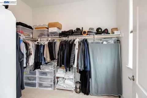 a bathroom with a shower sink double and mirror