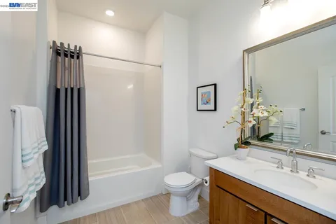 a view of a hallway with washer and dryer