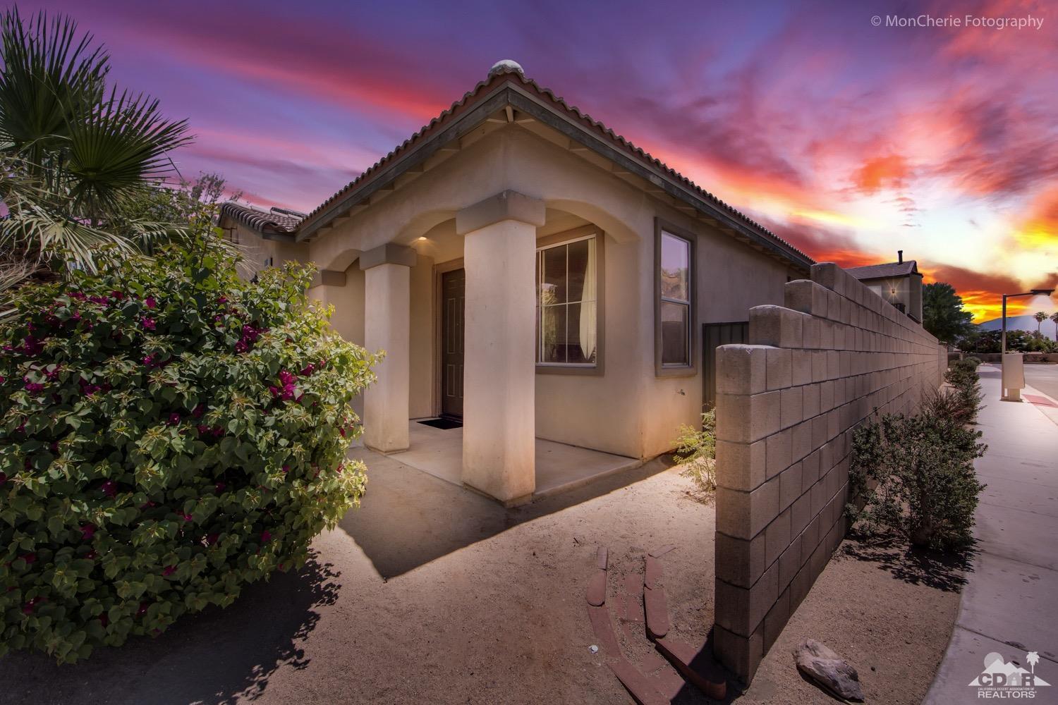 82903 Corte Lucia Indio, CA 92201 - Photo 2 of 26 a front view of a house with a yard