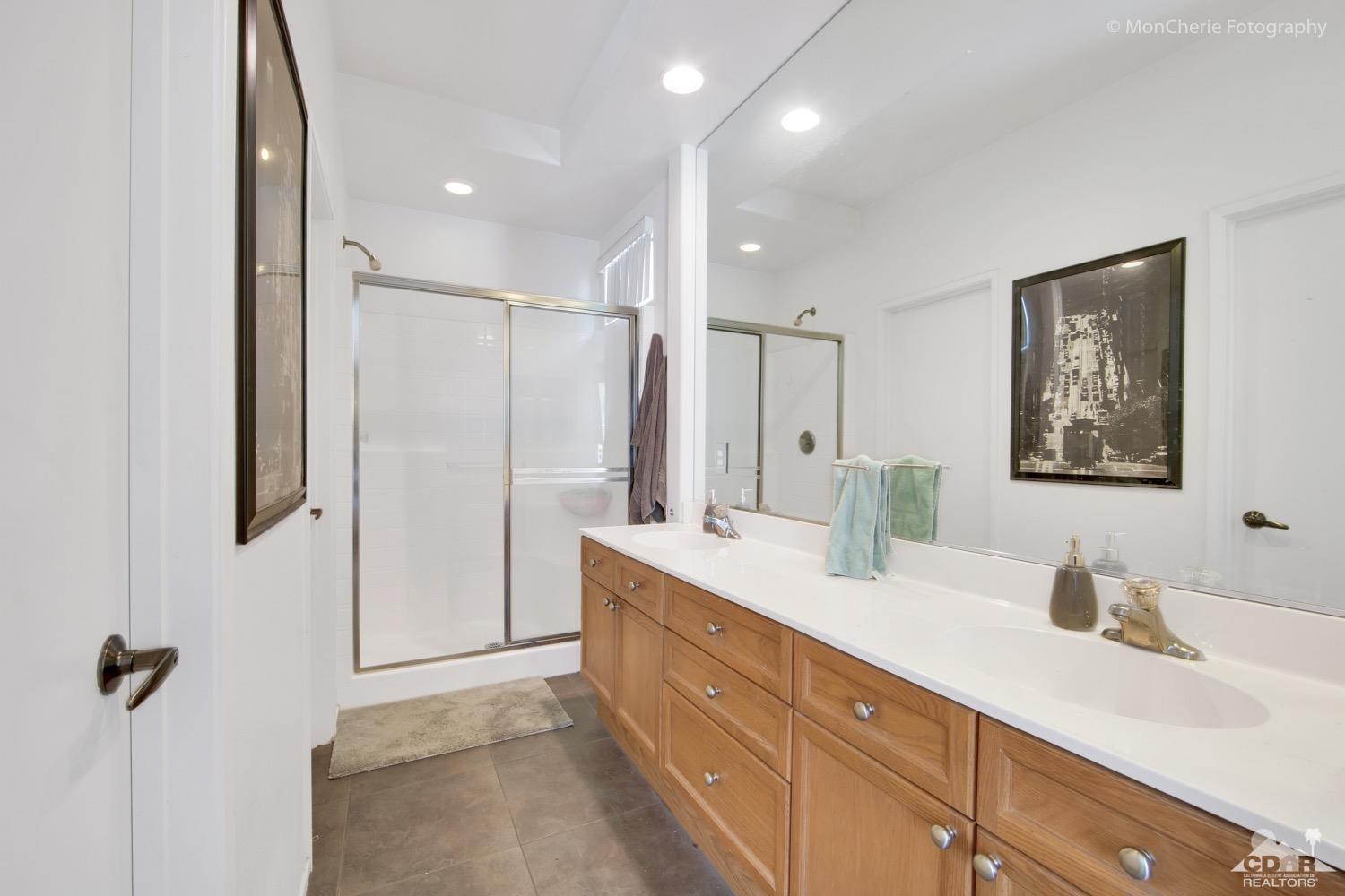 82903 Corte Lucia Indio, CA 92201 - Photo 15 of 26 a bathroom with a double vanity sink mirror and double