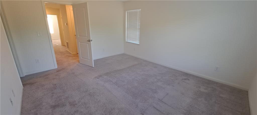 1683 Vernon Boulevard Decatur, GA 30035 - Photo 9 of 14 a view of a hallway to rooms