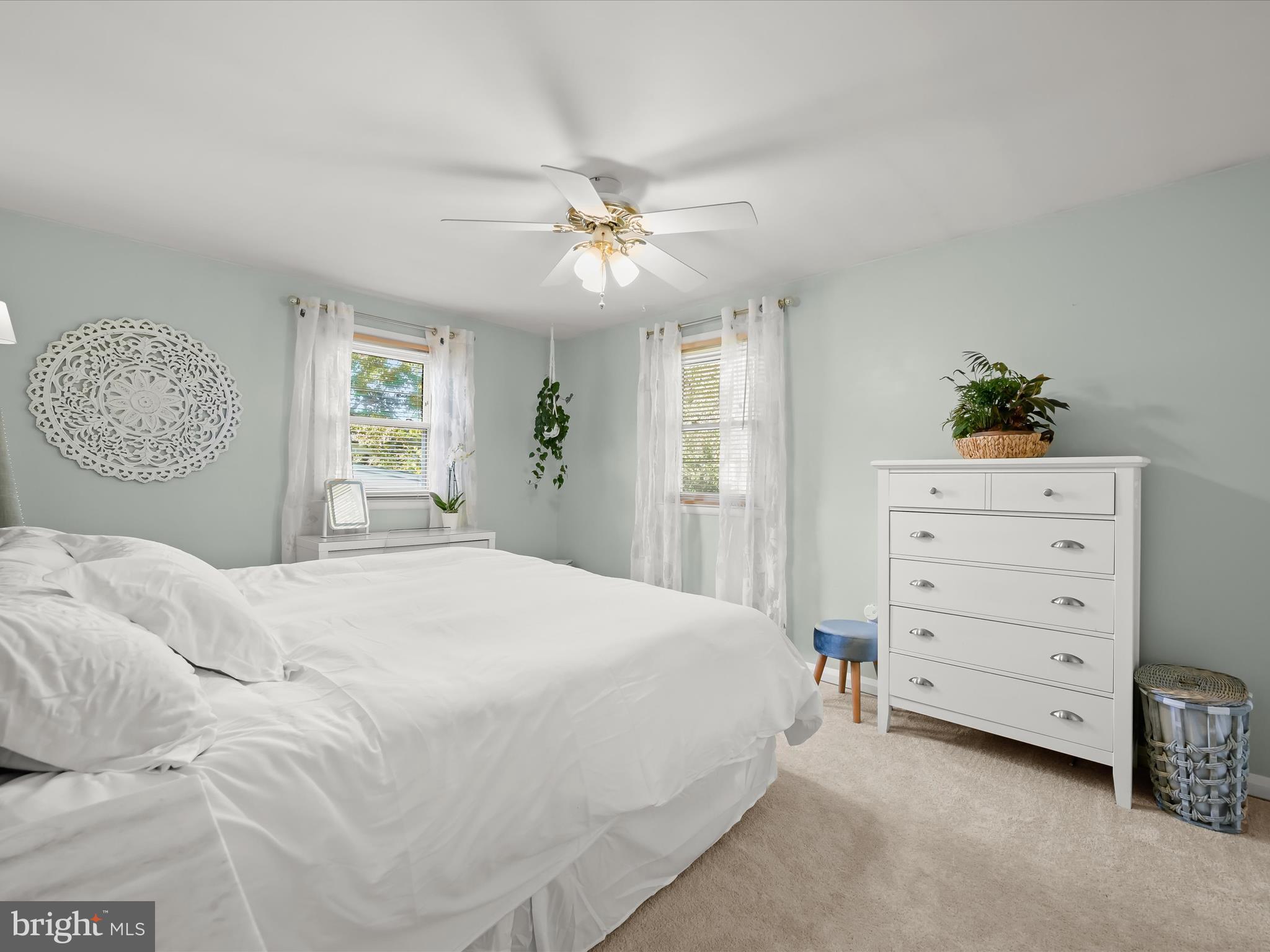 1910 Rollingwood Road Catonsville, MD 21228 - Photo 19 of 40 a bedroom with a bed and a dresser