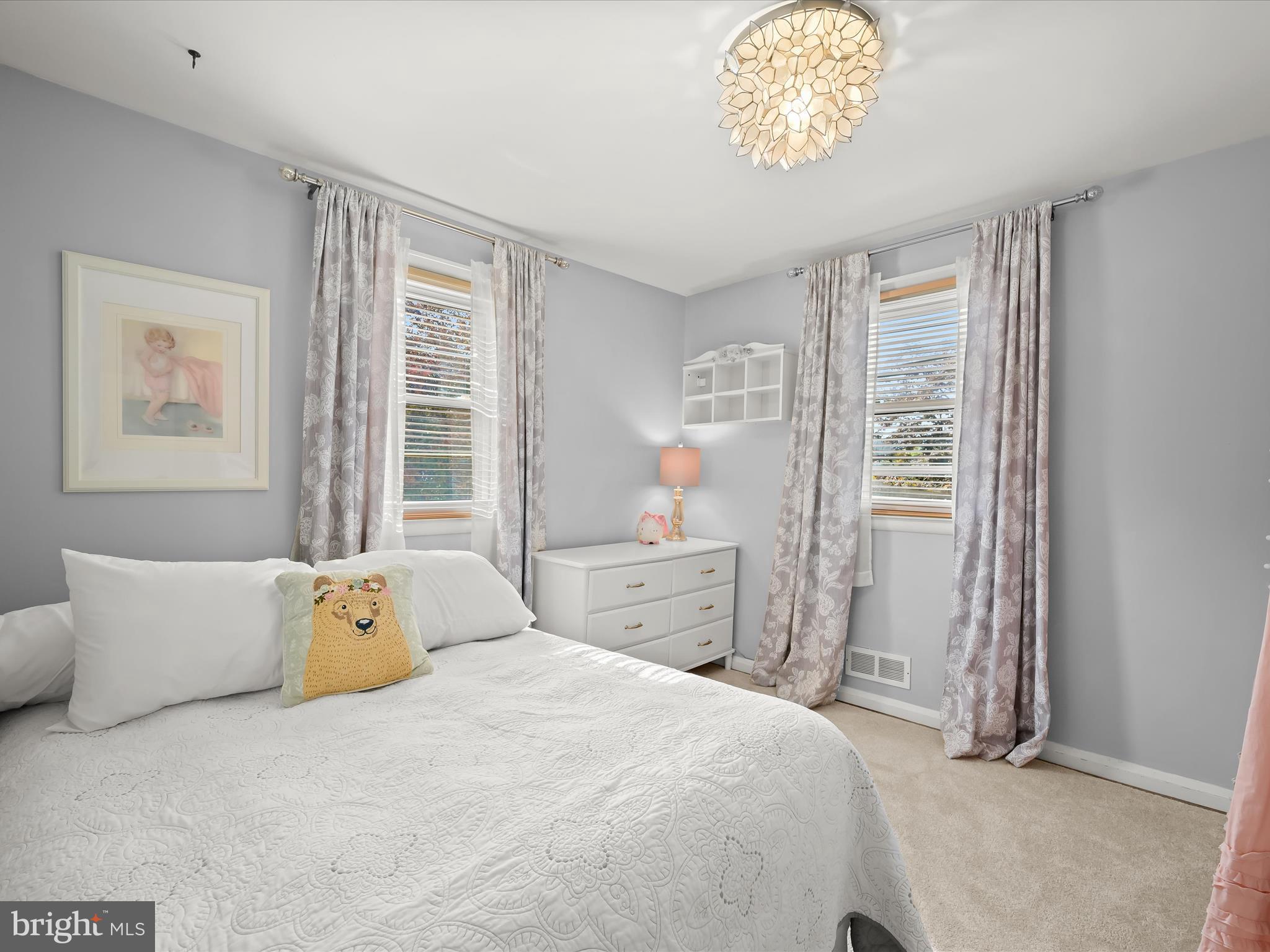 1910 Rollingwood Road Catonsville, MD 21228 - Photo 21 of 40 a bedroom with a bed and a window