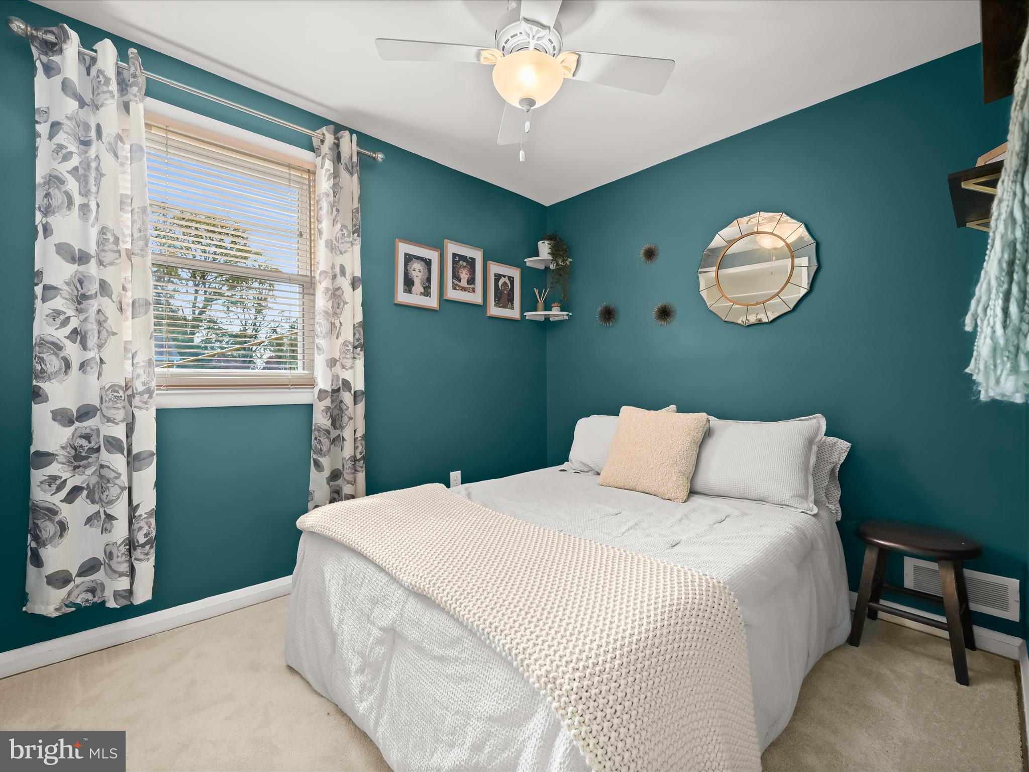 1910 Rollingwood Road Catonsville, MD 21228 - Photo 23 of 40 a bedroom with a bed and a window