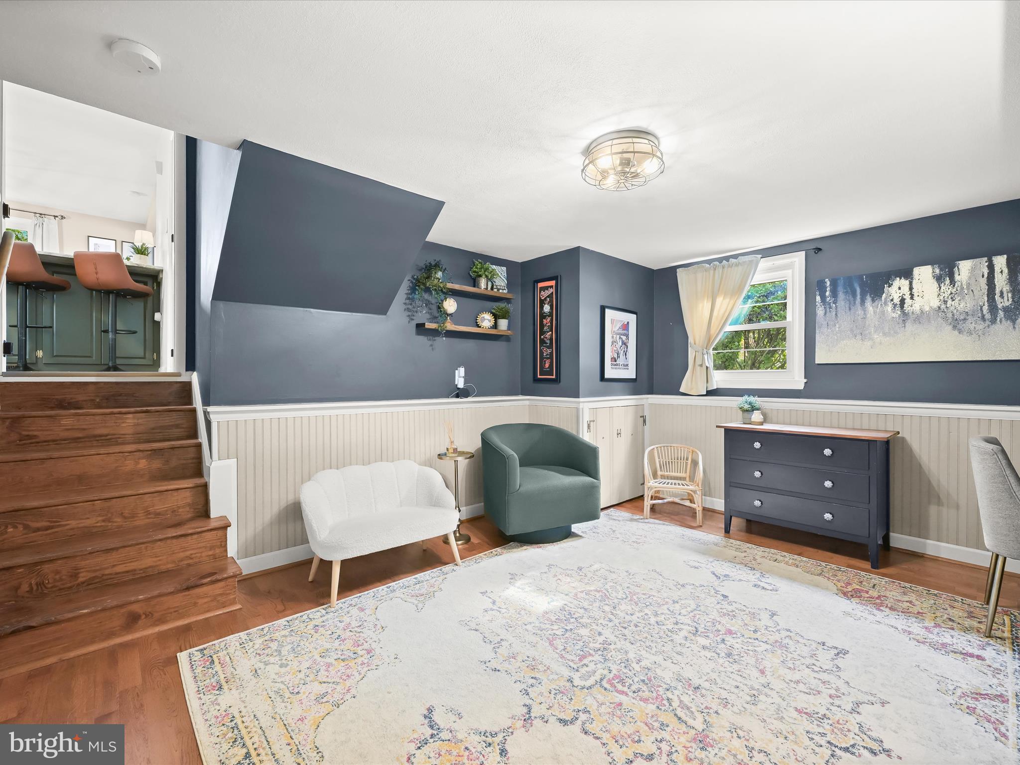 1910 Rollingwood Road Catonsville, MD 21228 - Photo 27 of 40 a bedroom with a bed and a dresser in it