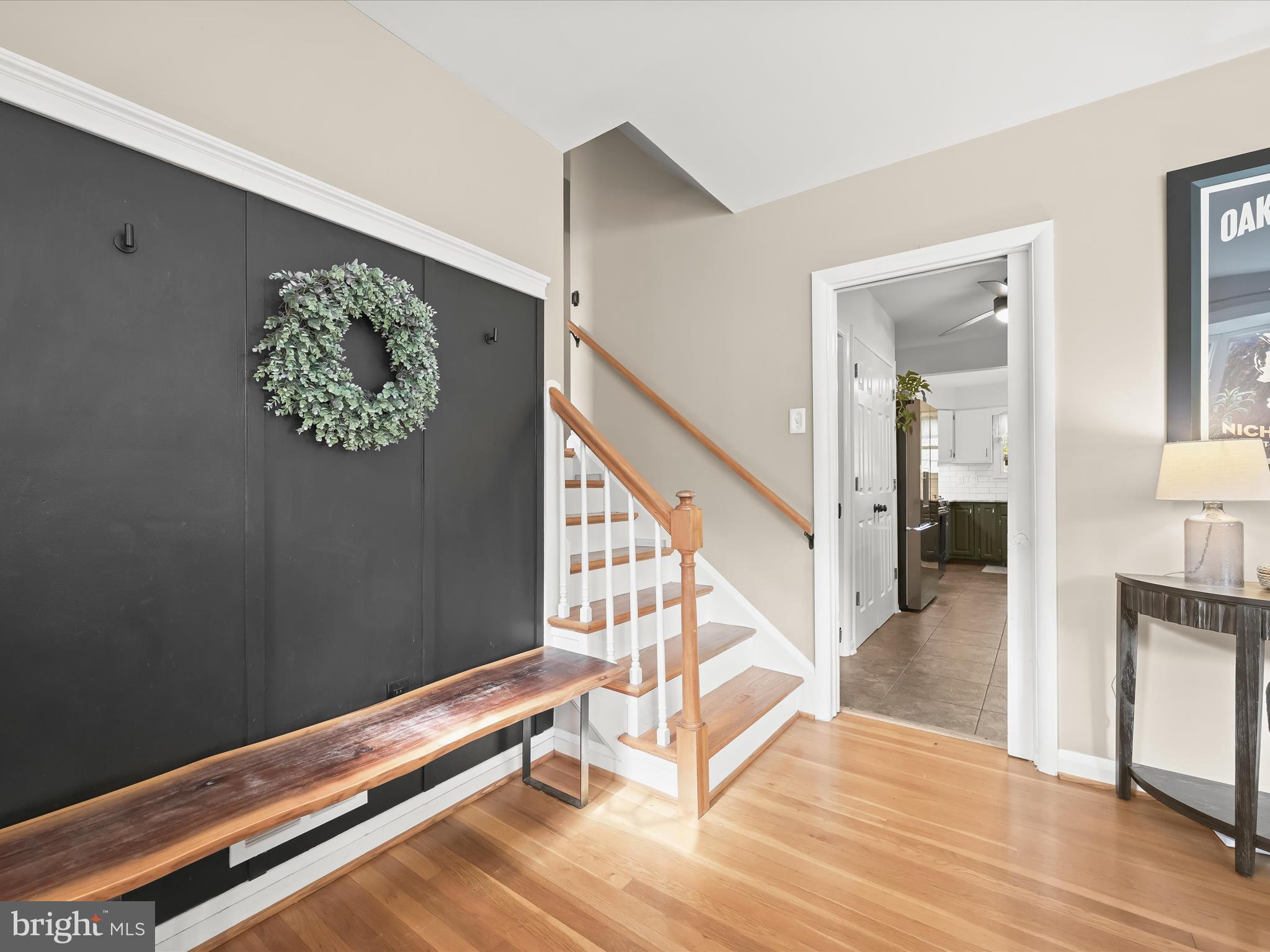 1910 Rollingwood Road Catonsville, MD 21228 - Photo 6 of 40 a view of entryway with stairs and wooden floor