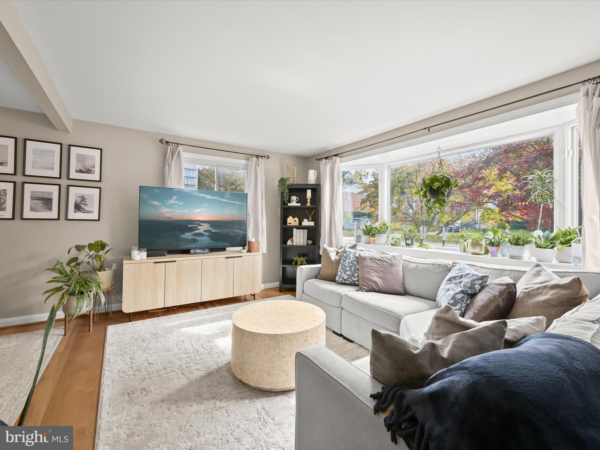 1910 Rollingwood Road Catonsville, MD 21228 - Photo 7 of 40 a living room with furniture and a flat screen tv