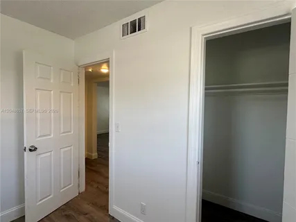 a view of small space with racks on the wall