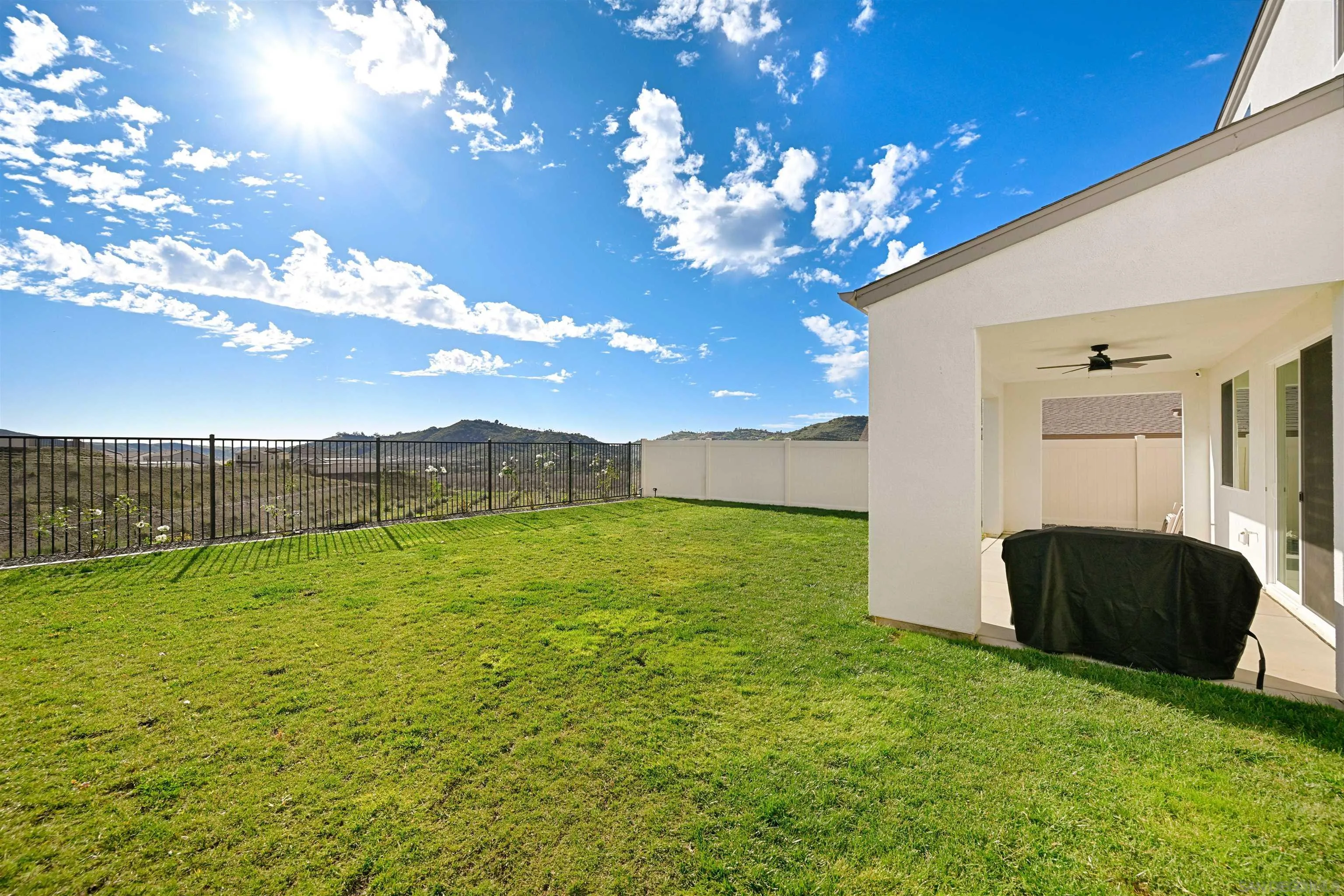 35158 Orchard Trail Fallbrook, CA 92028 - Photo 25 of 40 a view of a house with a big yard