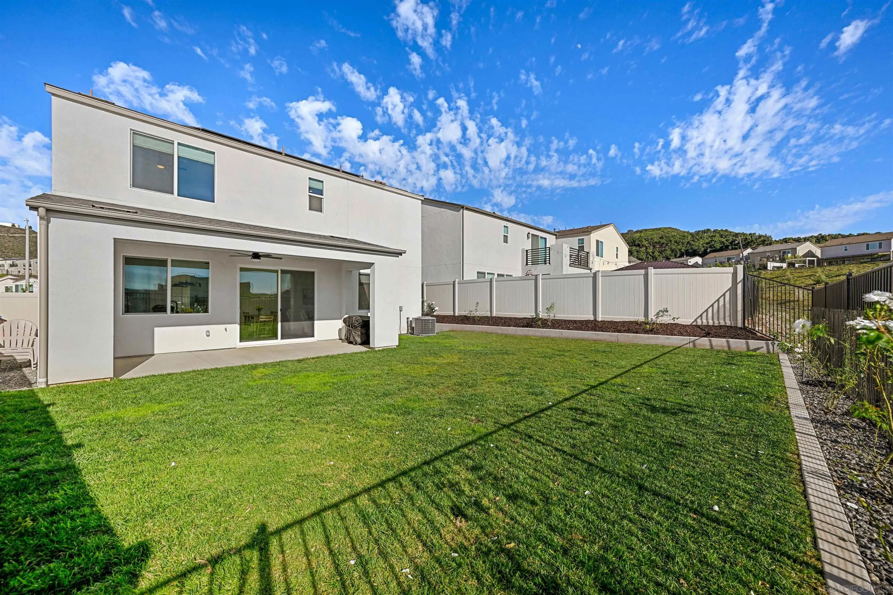 35158 Orchard Trail Fallbrook, CA 92028 - Photo 26 of 40 a view of a house with backyard and porch