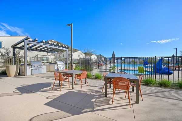 a view of houses with outdoor space and swimming pool