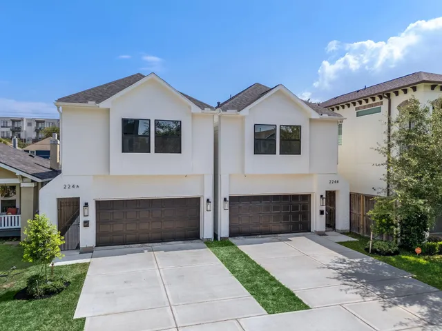 a front view of a house with yard