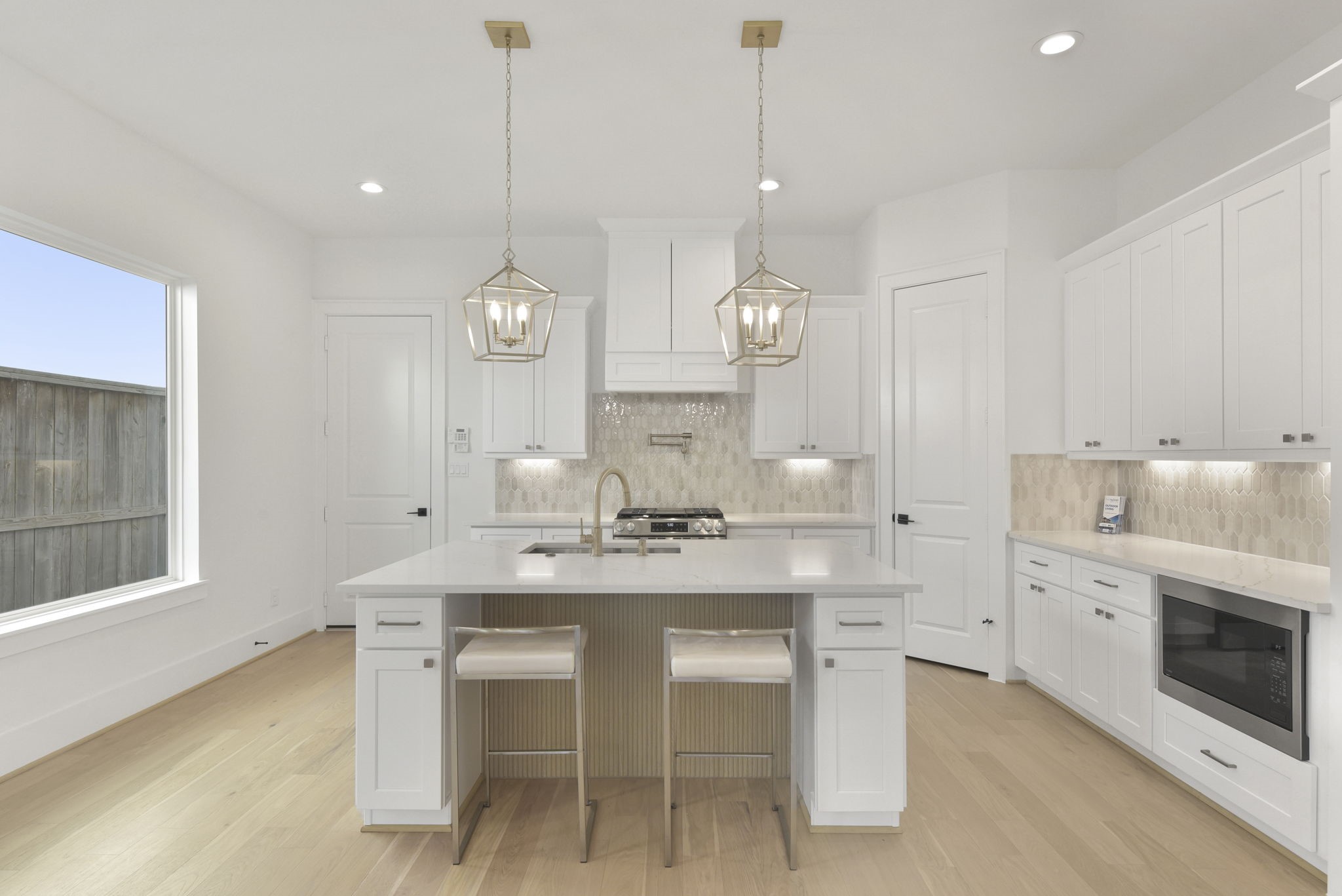 2916 Virginia Street Houston, TX 77098 - Photo 2 of 19 a kitchen with a sink and stove
