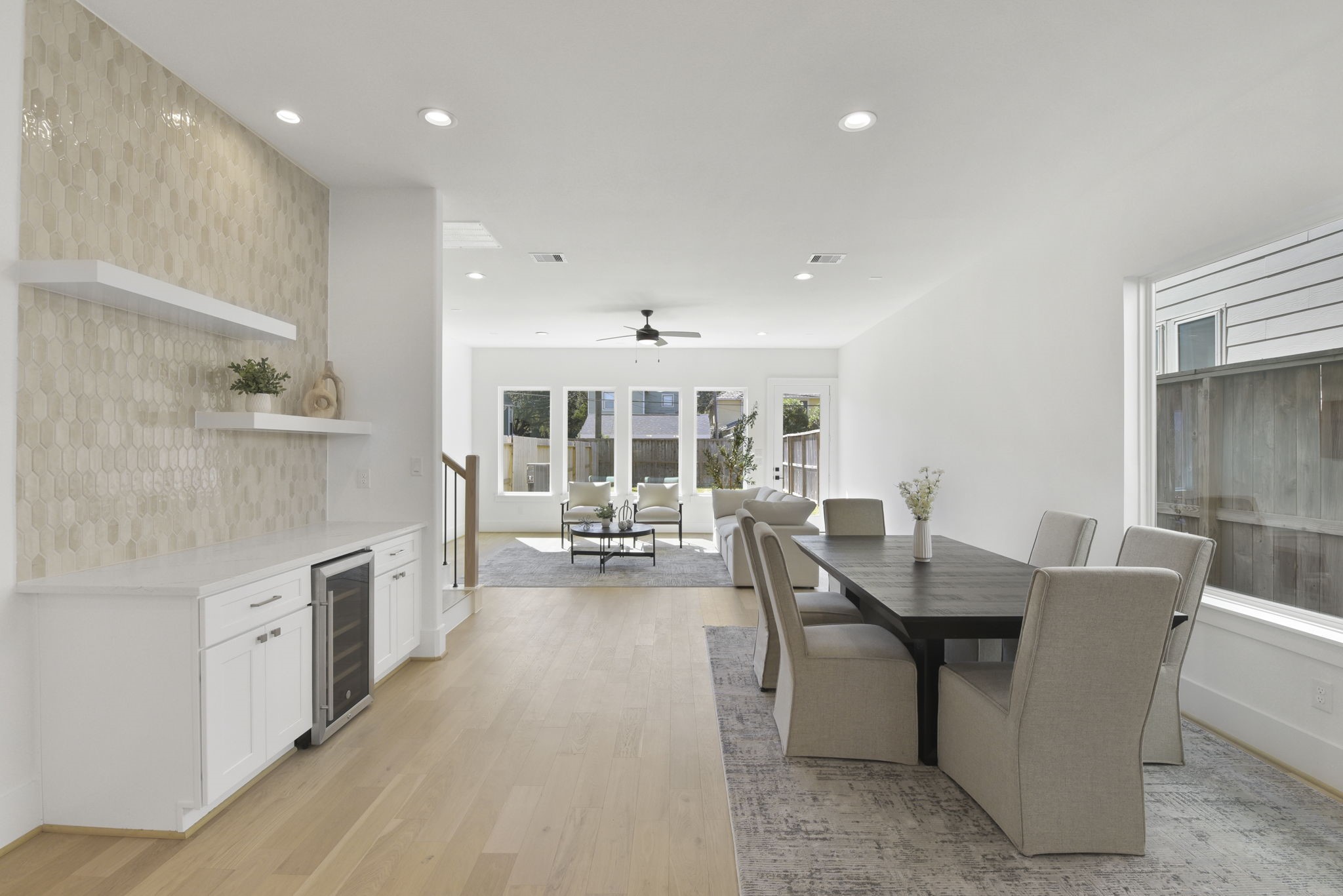 2916 Virginia Street Houston, TX 77098 - Photo 8 of 19 a large dining hall with stainless steel appliances granite countertop a stove and a sink