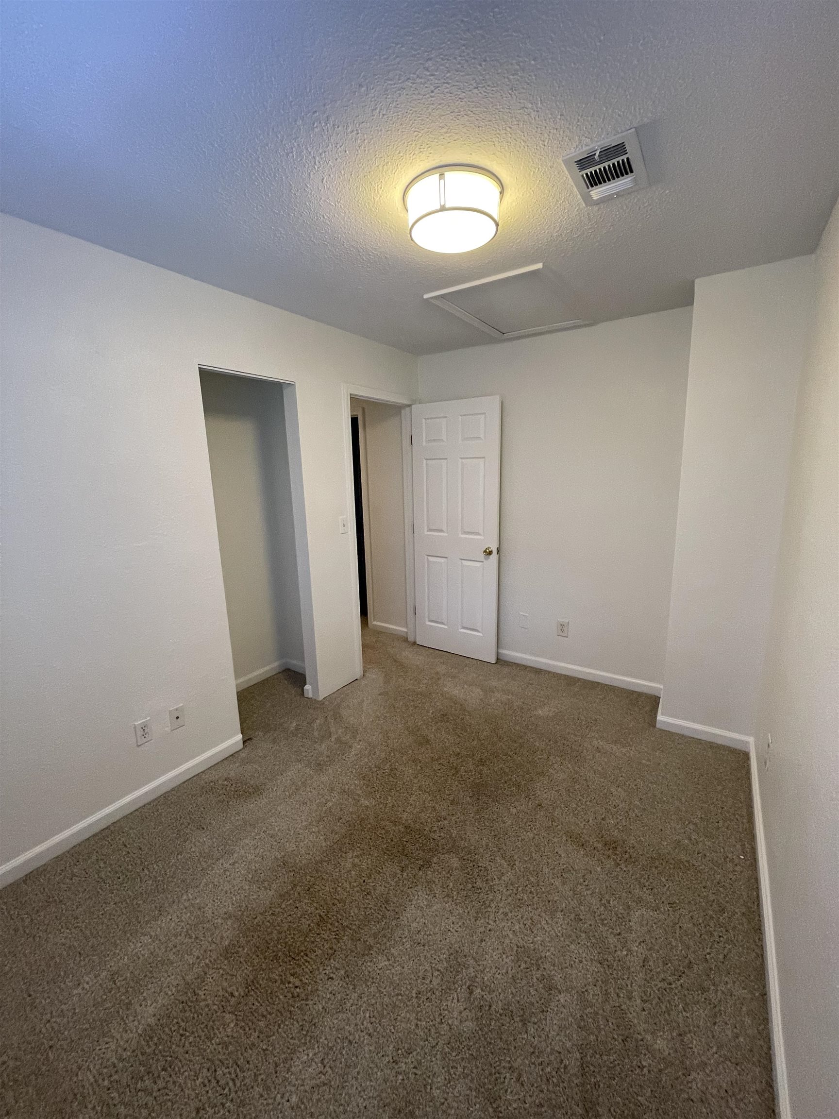 4420 Carter Road, Unit 60 St. Augustine, FL 32086 - Photo 12 of 14 a view of an empty room and a window