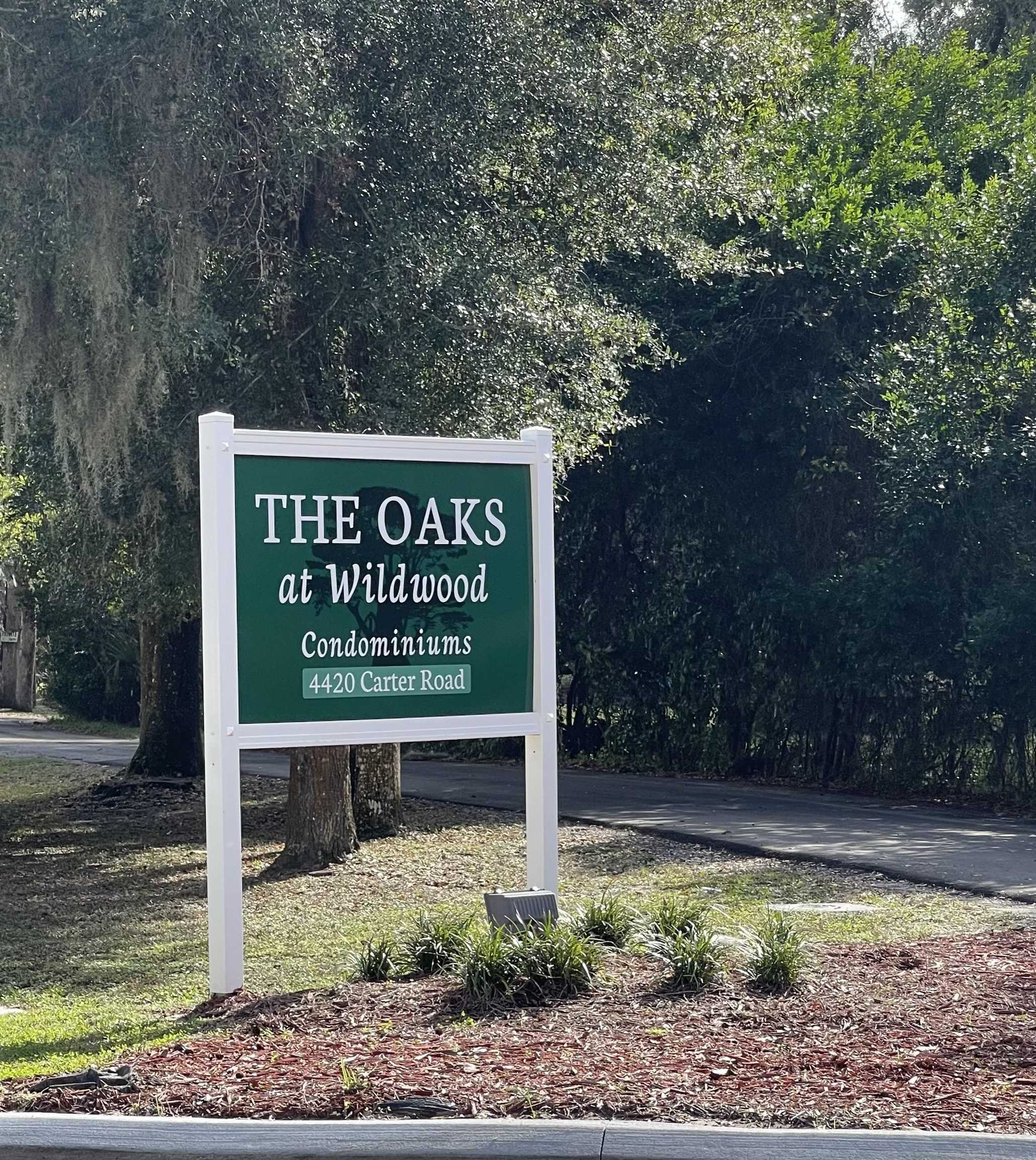 4420 Carter Road, Unit 60 St. Augustine, FL 32086 - Photo 14 of 14 a sign on the side of a building