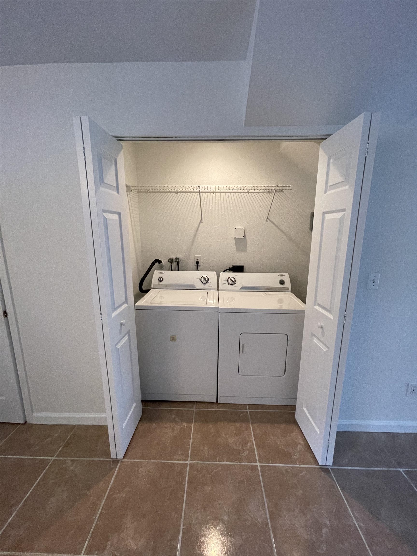 4420 Carter Road, Unit 60 St. Augustine, FL 32086 - Photo 5 of 14 a utility room with a sink a washer and dryer