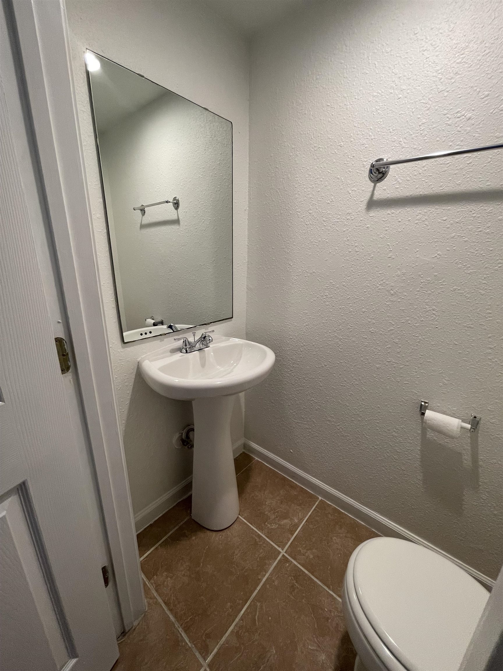 4420 Carter Road, Unit 60 St. Augustine, FL 32086 - Photo 6 of 14 a white toilet sitting next to a white sink