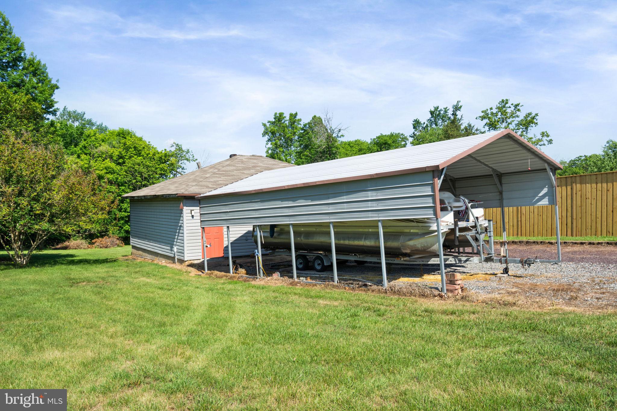 161 Troy Road Louisa, VA 23093 - Photo 34 of 60 a house view with a garden space