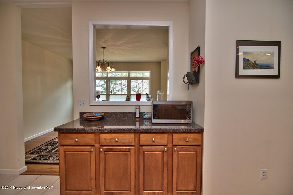 801 Forest Road Lake Ariel, PA 18436 - Photo 15 of 54 a bathroom with a sink and a mirror