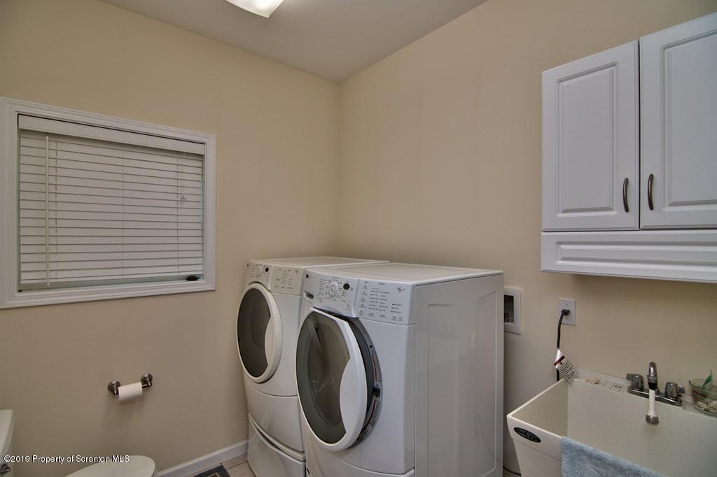 801 Forest Road Lake Ariel, PA 18436 - Photo 19 of 54 a utility room with dryer and washer