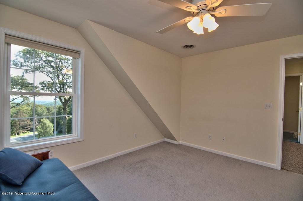 801 Forest Road Lake Ariel, PA 18436 - Photo 33 of 54 a view of room with window and ceiling fan