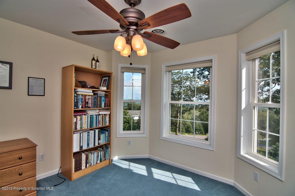 801 Forest Road Lake Ariel, PA 18436 - Photo 36 of 54 a view of a livingroom with a bookshelf