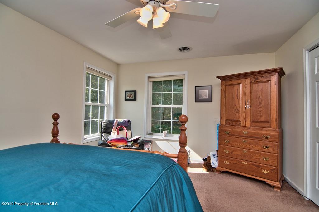 801 Forest Road Lake Ariel, PA 18436 - Photo 40 of 54 a living room with furniture and a window