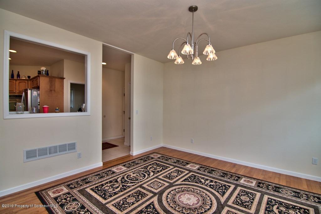 801 Forest Road Lake Ariel, PA 18436 - Photo 6 of 54 a view of a bedroom with wooden floor