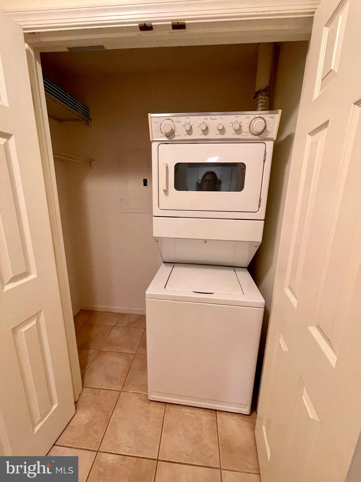 12009 Taliesin Place, Unit 31 Reston, VA 20190 - Photo 15 of 19 a utility room with dryer and washer